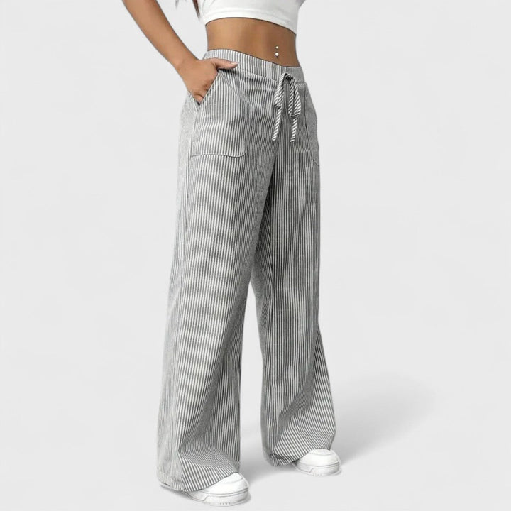 Dominique - Pantalones cómodos y amplios con detalles elegantes