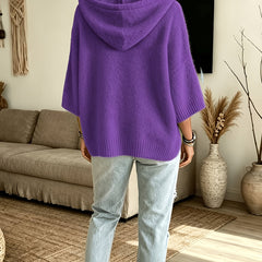 Espalda del poncho Micaela en morado, más largo por detrás