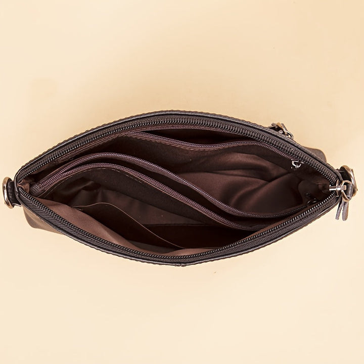 El | Elegante bolso bandolera de piel minimalista de Elena