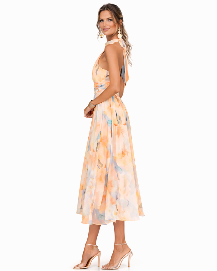 Dolores | Vestido largo fluido con cuello halter y estampado artístico
