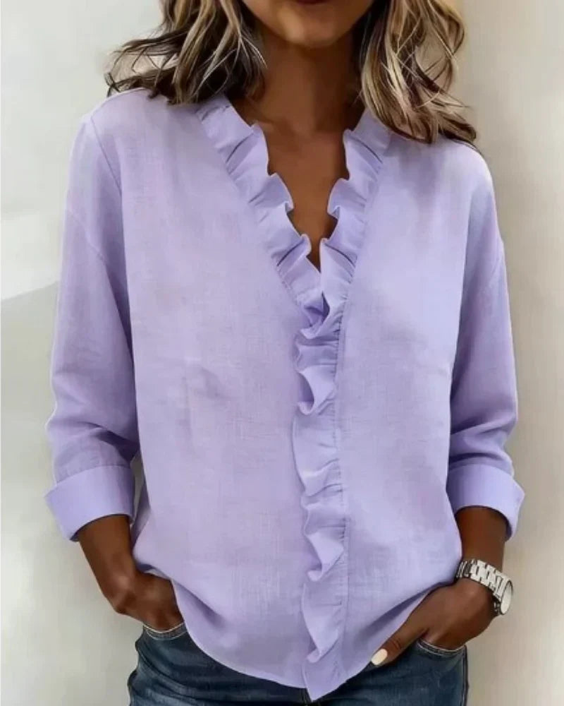 Irene | Blusa elegante con volantes, escote en V y mangas largas