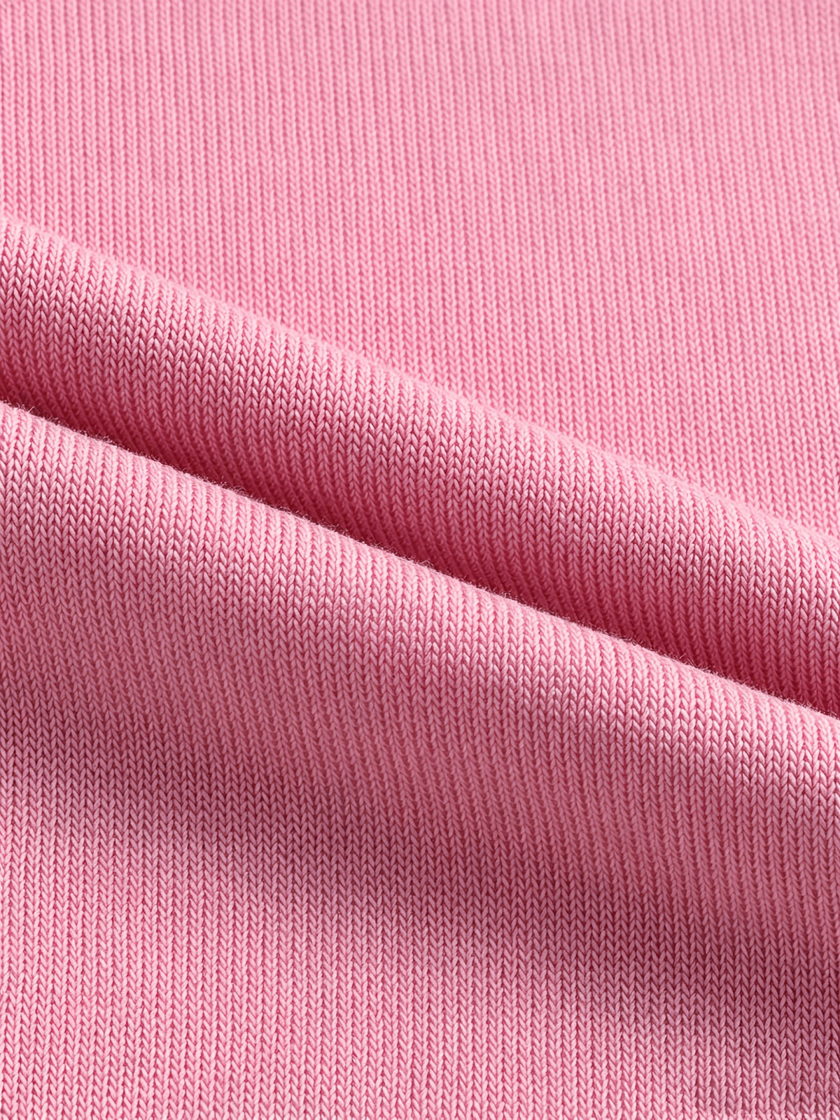 Cárdigan con capucha y botones en rosa, con vaqueros