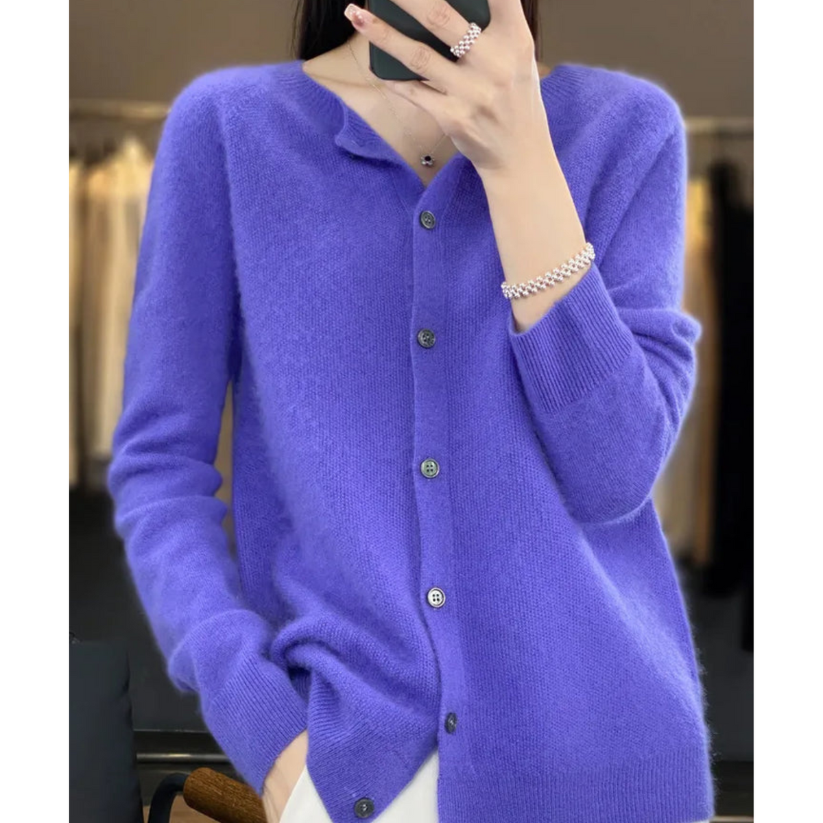 Cárdigan de punto fino en azul oscuro con cuello redondo
