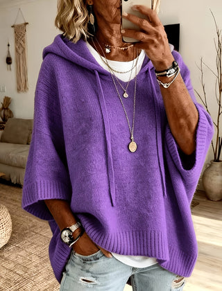 Poncho Micaela en morado de frente, con capucha y cordón