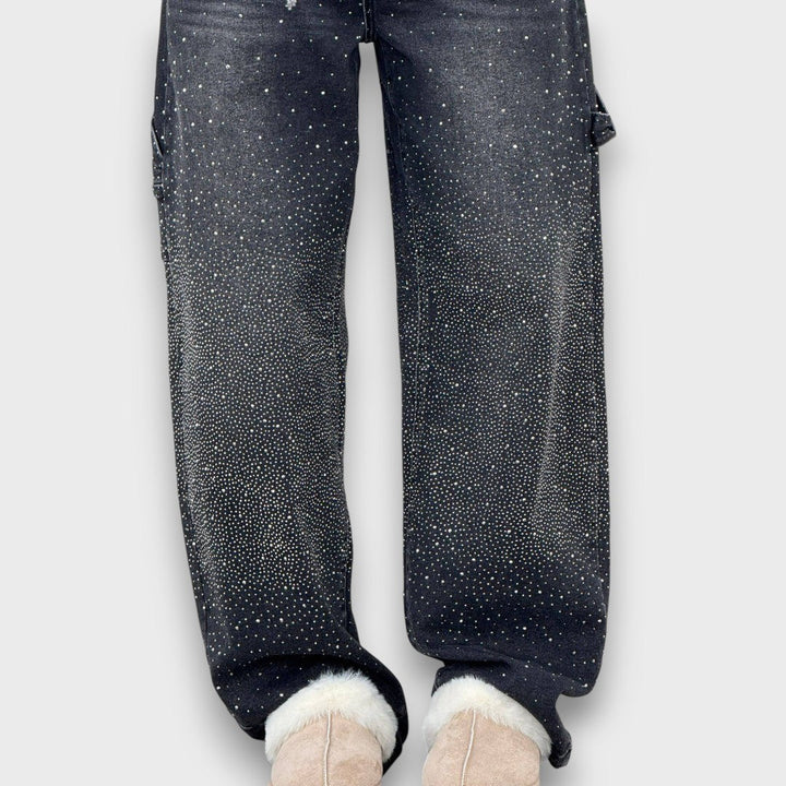 Nolene – Jeans con acabado brillante y carácter urbano