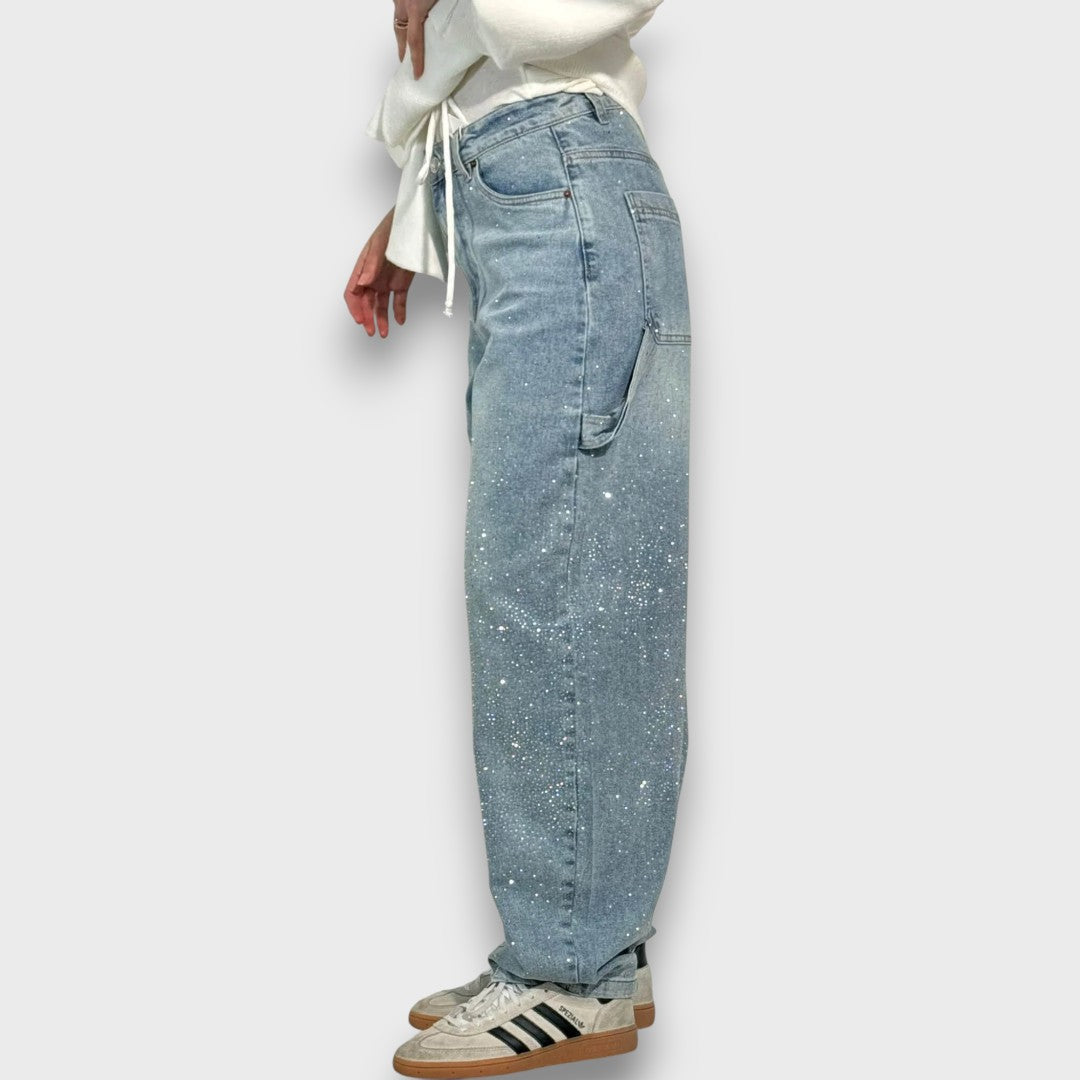 Nolene – Jeans con acabado brillante y carácter urbano
