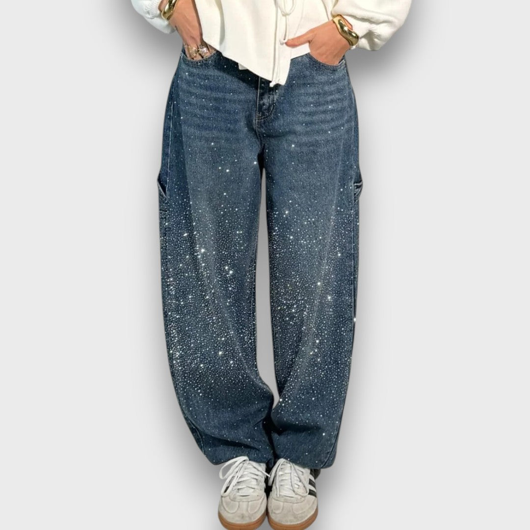 Nolene – Jeans con acabado brillante y carácter urbano