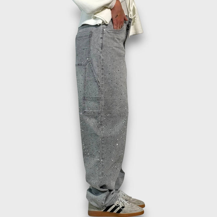 Nolene – Jeans con acabado brillante y carácter urbano