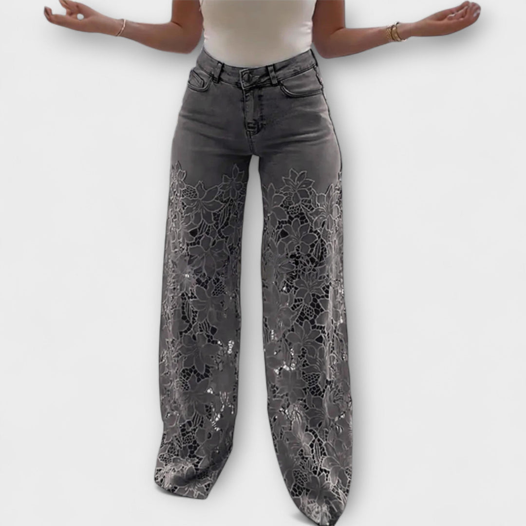 Virelle – Jeans con transparencia floral y pierna ancha
