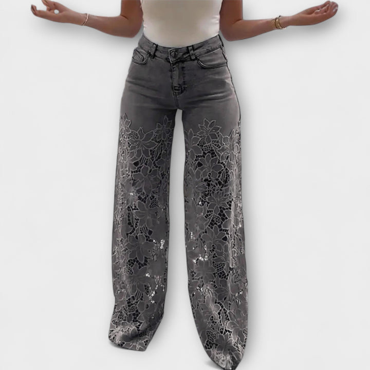 Virelle – Jeans con transparencia floral y pierna ancha