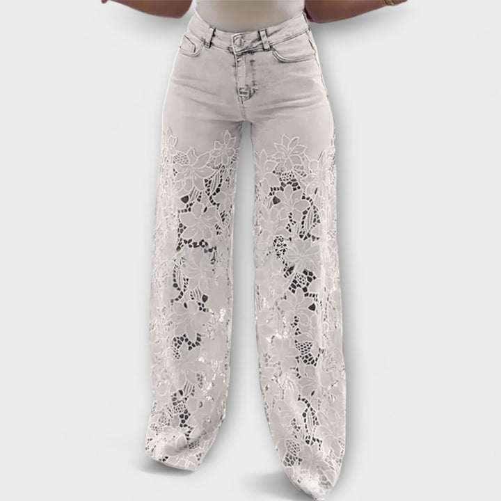 Virelle – Jeans con transparencia floral y pierna ancha