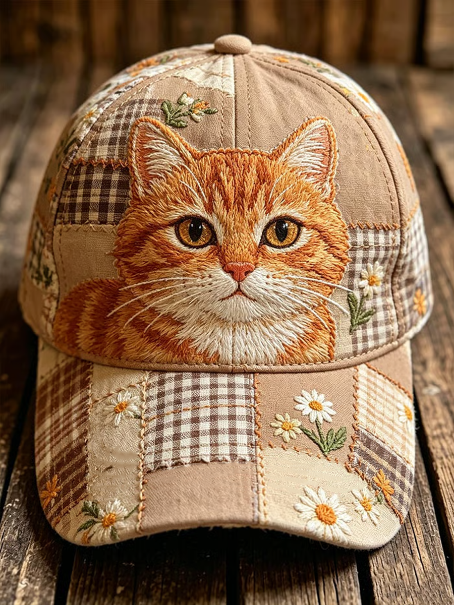 Gorra patchwork con gato naranja