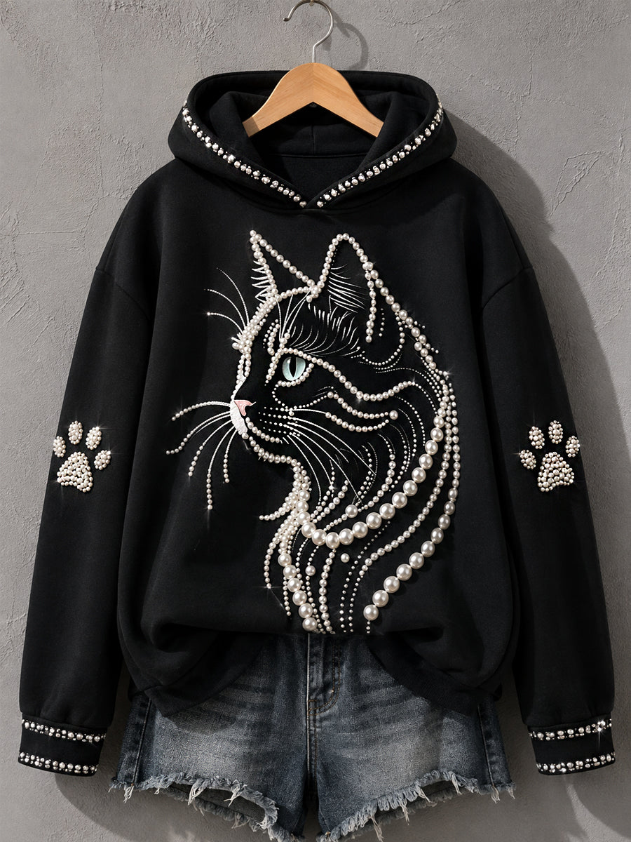 Sudadera negra con gato de perlas de perfil